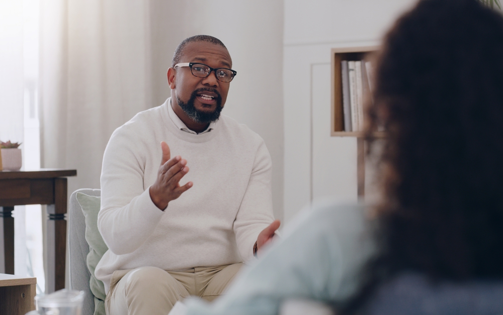 Male patient consulting a therapist